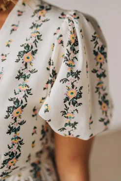 Blooming Tie Front Peplum Top