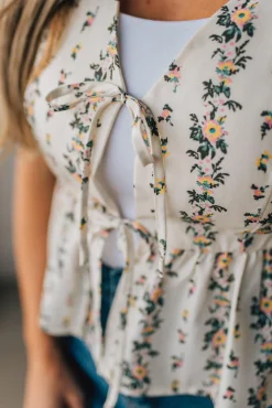 Blooming Tie Front Peplum Top
