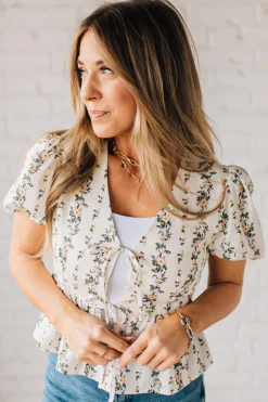 Blooming Tie Front Peplum Top